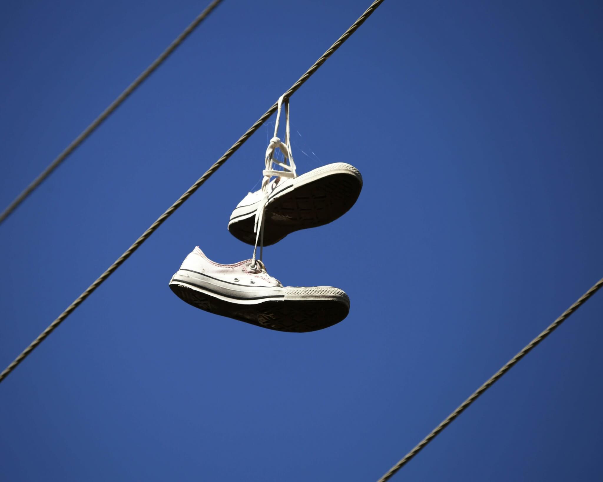 Shoes dangling